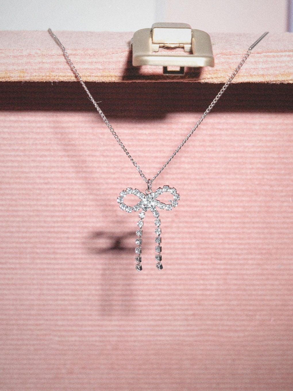 【BUBBLES】ビジューリボンネックレス