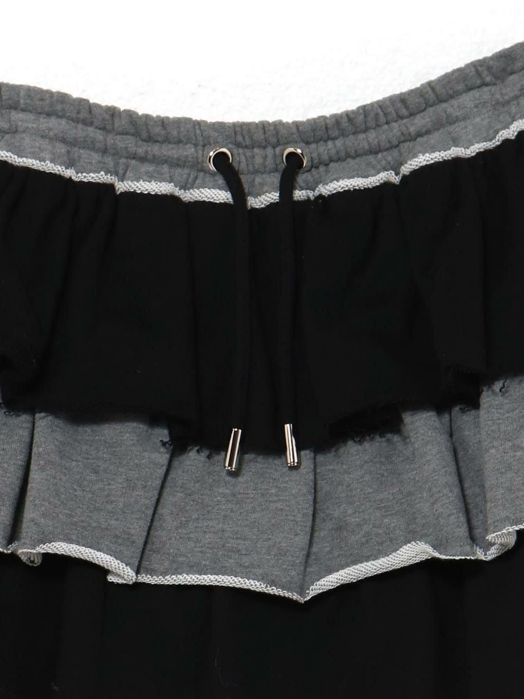 【BUBBLES】バイカラーフリルスウェットスカパン